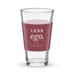 Clear pint glass with a wine-colored band printed "Less ego"