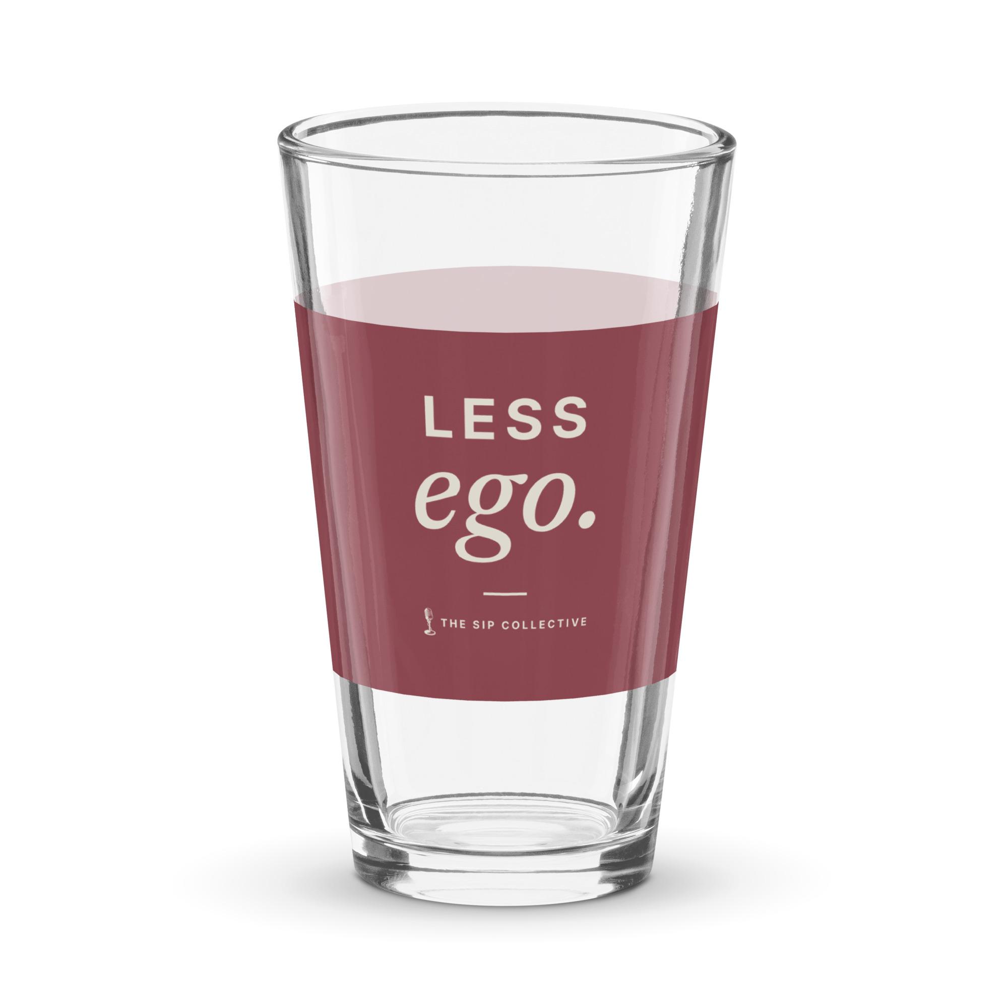 Clear pint glass with a wine-colored band printed "Less ego"