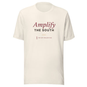 Vintage white unisex t-shirt printed "Amplify the South" with The Sip Collective microphone logo